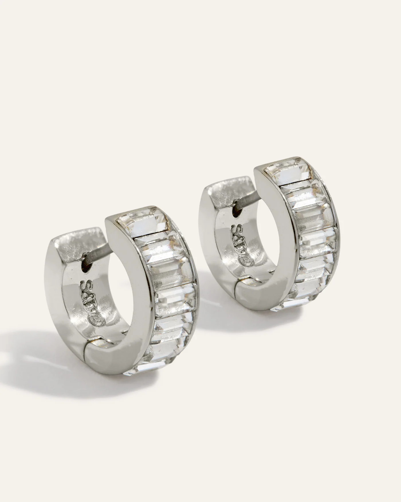 Channel Set Huggie Earrings in Rhodium Plated Silver Tone