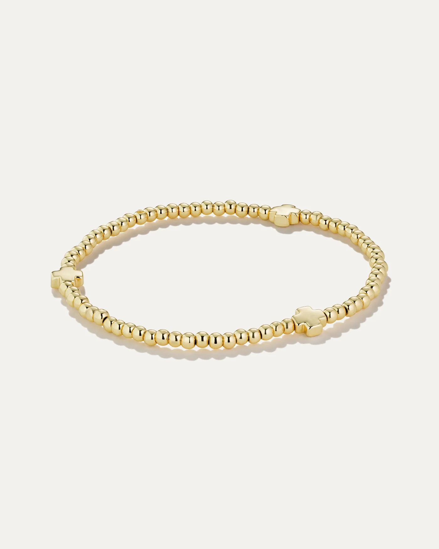 Kreuz-Perlen-Stretcharmband in Gold- oder Rhodiumbeschichtung